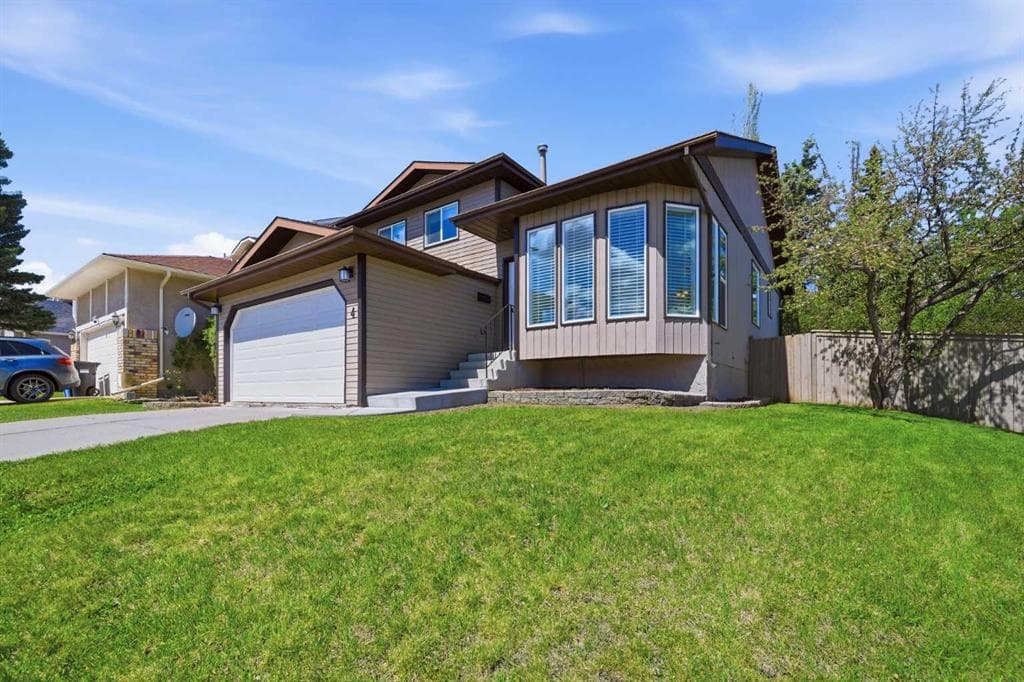 4-bed Detached for sale at 4 Woodstock Road SW, Calgary